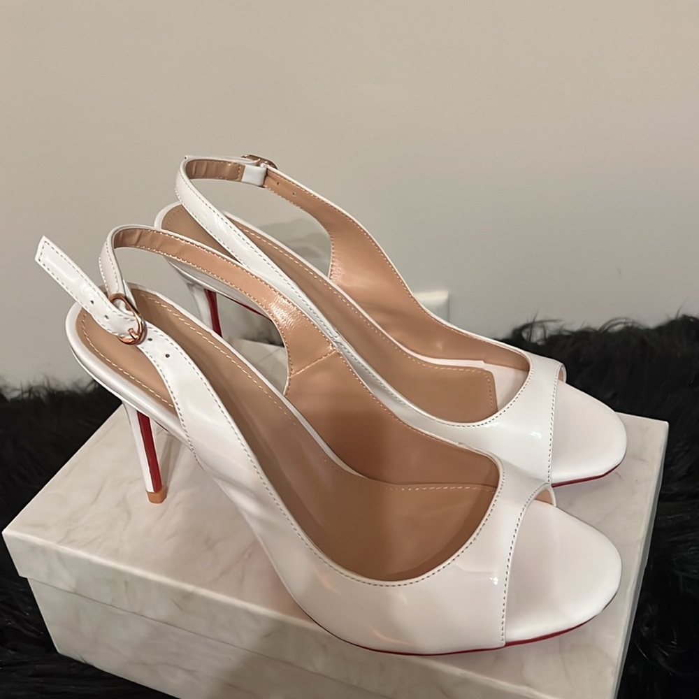 Elegant White Heels with Red Accents